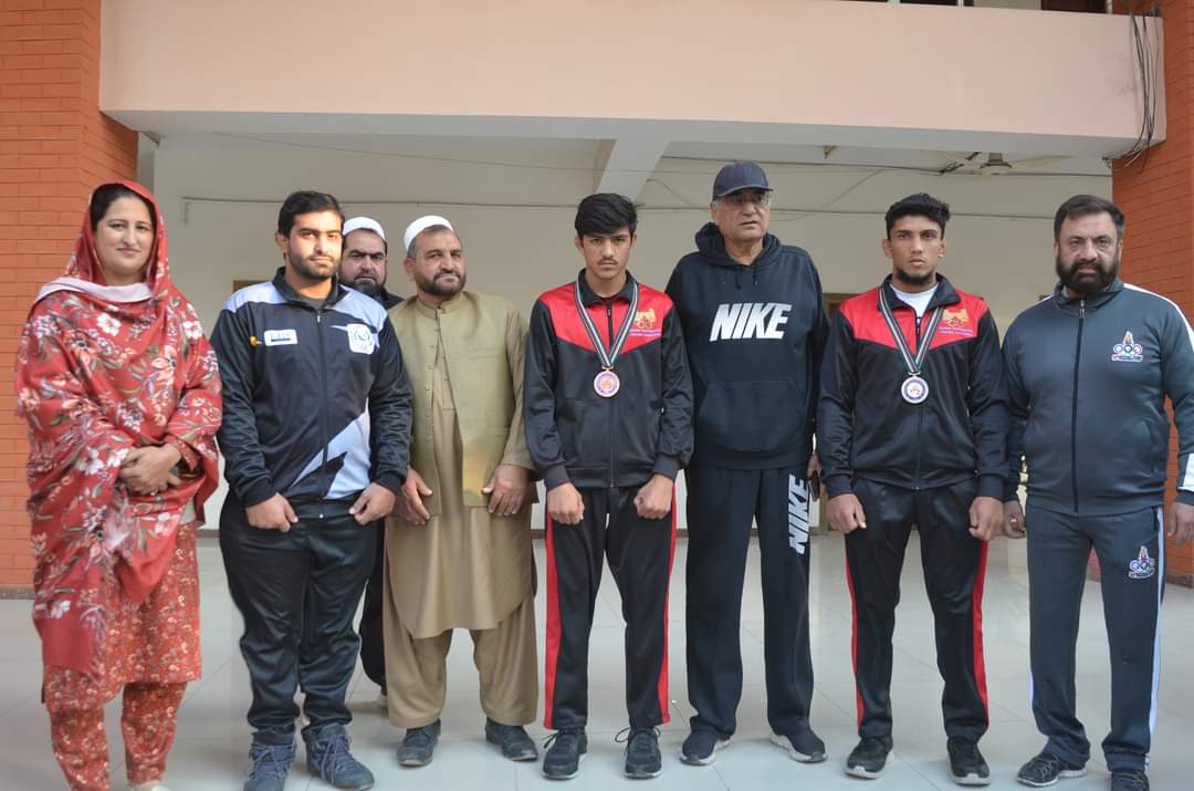 نیشنل ریسلنگ چیمپئن شپ میں میڈلز جیتنے والے کھلاڑیوں کے اعزاز میں تقریب